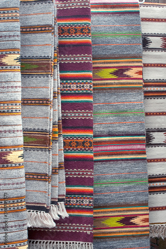 The majority of patterns and colors of traditional hutsul rugs on the fair photo
