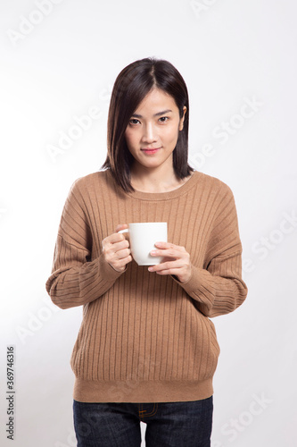 The Asian woman standing on the white background.