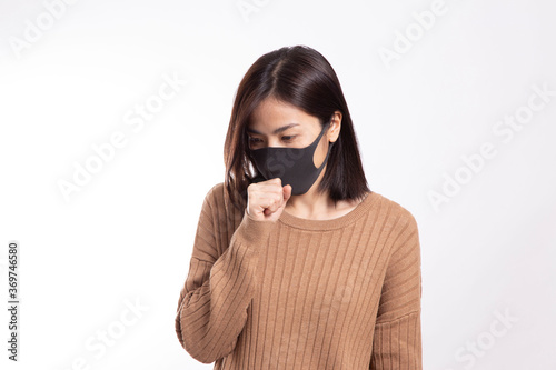 The Asian woman standing on the white background.