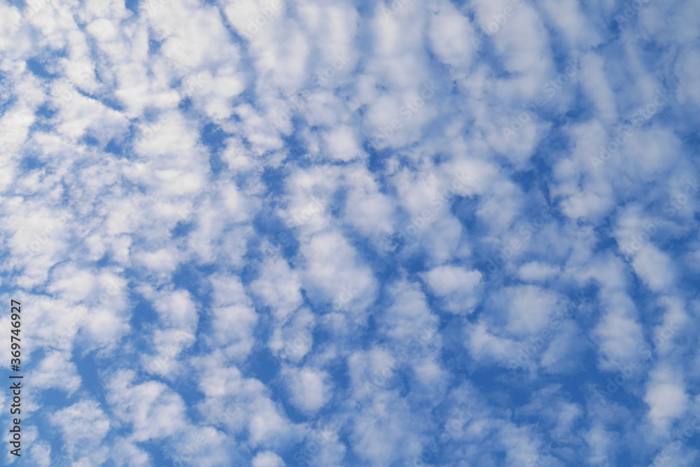 Natural clear blue sky with some clouds for background or backdrop freedom concept