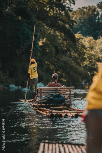 River rafting captain working hard in Port Antonio Jamaica.