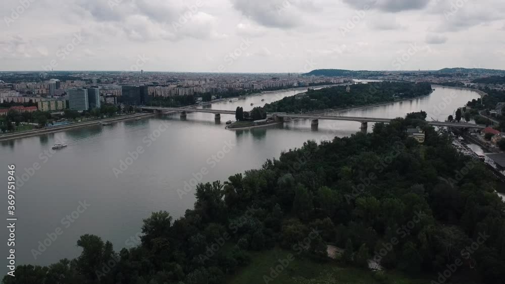 Dramatic Aerial flight showing Budapest city and Margaret Island during dusty cloudy day Dramatic Aerial flight showing Budapest city and Margaret Island during dusty cloudy day
