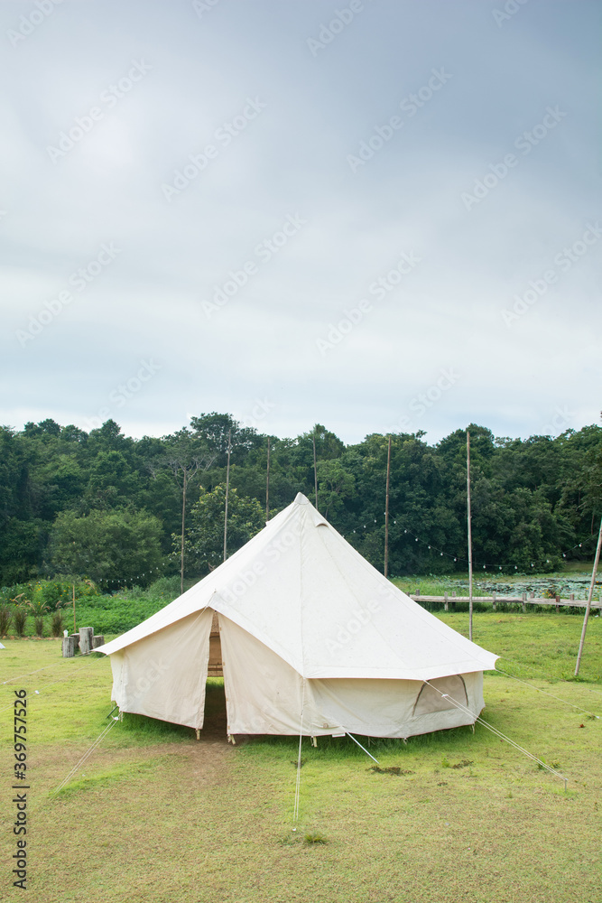 Traditional canvas bell tent in countryside