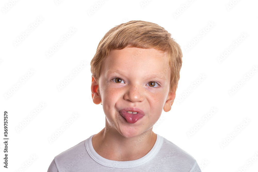 Speech therapy concept. Little boy doing exercises for correct pronunciation. Isolation on a white background. High quality photo Speech therapy concept. Little boy doing exercises for correct pronunciation. Isolation on a white background. High quality photo
