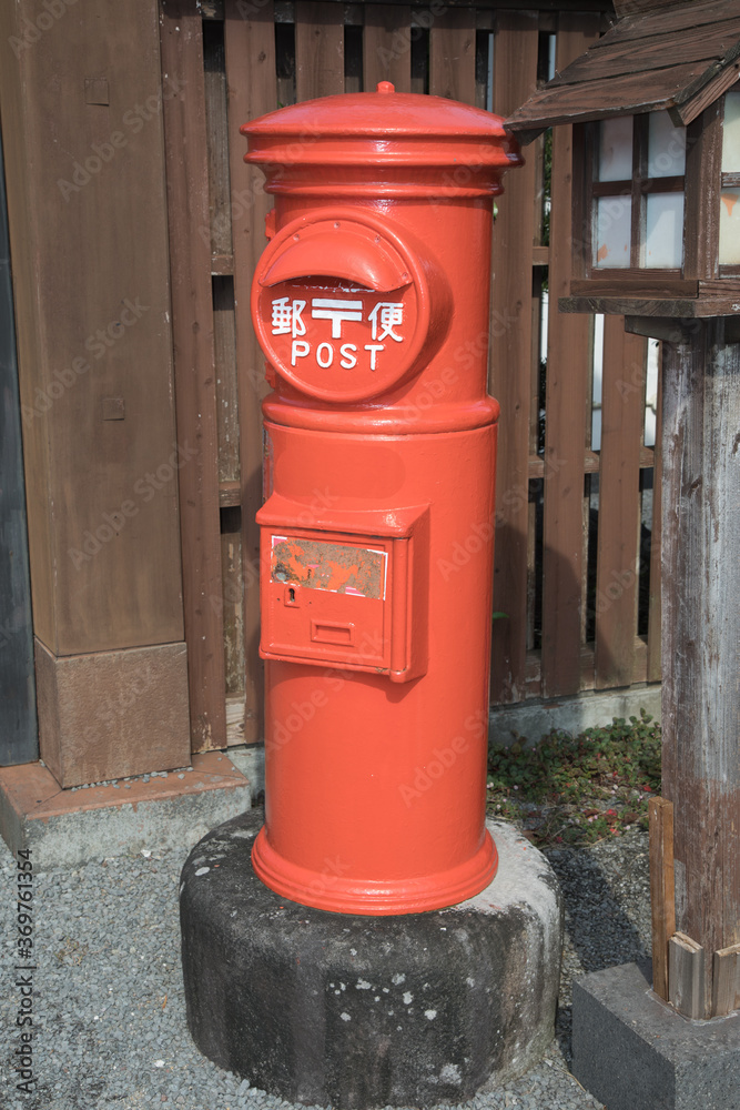 Disused traditional Japanese post box, Shimabara, Japan. Japanese text translates as Post, which is also written in English Disused traditional Japanese post box, Shimabara, Japan. Japanese text translates as Post, which is also written in English