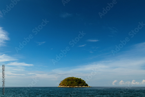 Alone little island in ocean