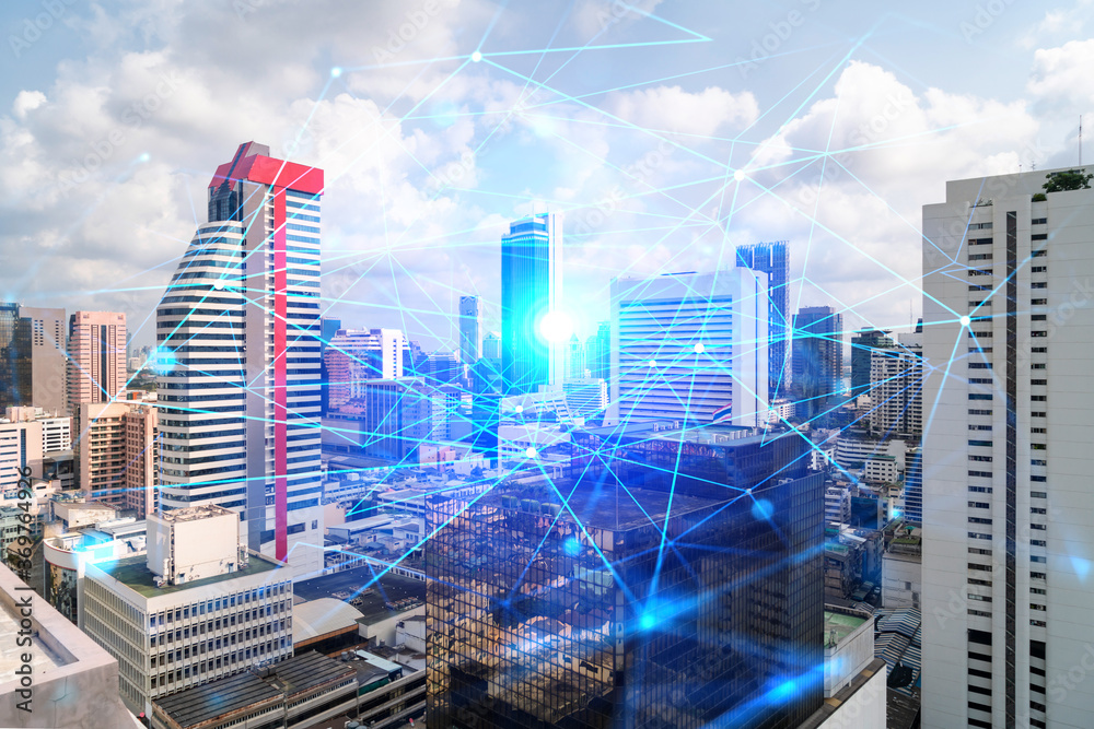 Obraz premium Abstract technology icons hologram over panorama city view of Bangkok, Asia. The concept of people networking and connections. Double exposure.