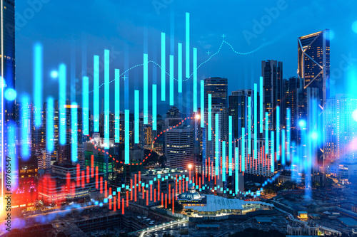 Photography FOREX graph hologram, aerial night panoramic cityscape of Kuala Lumpur