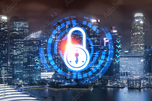Glowing Padlock hologram, night panoramic city view of Singapore, Asia. The concept of cyber security to protect companies. Double exposure.