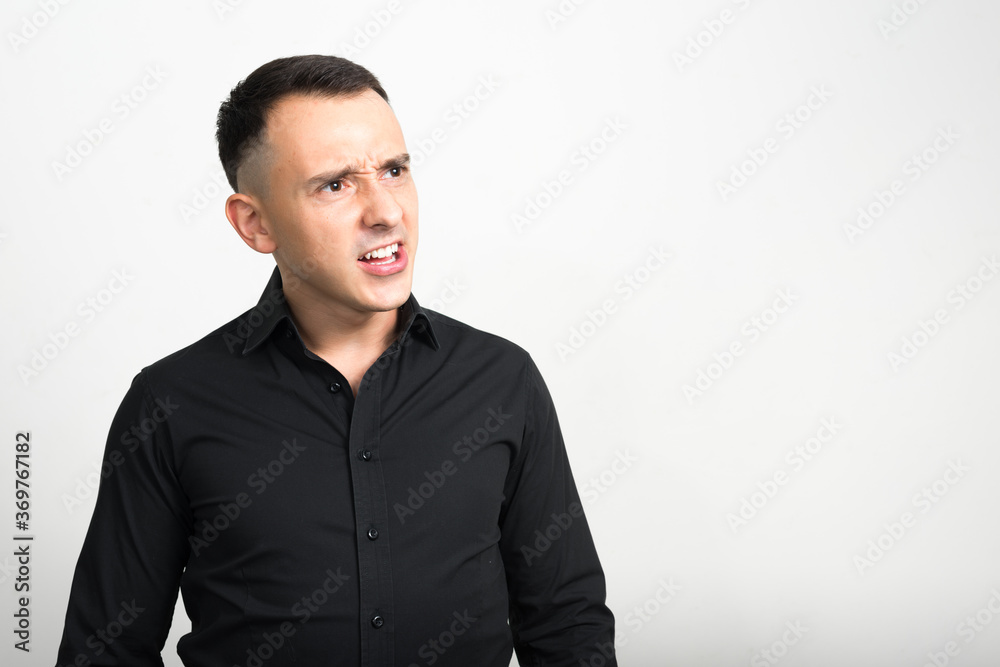 Portrait of handsome businessman against white background Portrait of handsome businessman against white background