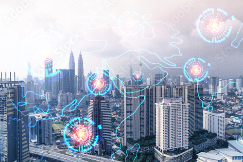 Canvas Print World planet Earth map hologram over panorama city view of Kuala Lumpur, Malaysia, Asia