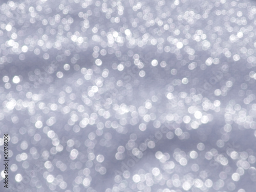 Shiny silver festive bokeh background