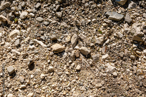Background image of a stone crumb with small and large stones