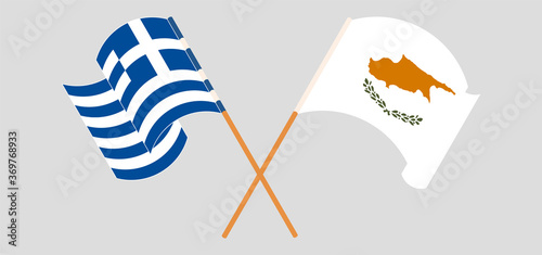 Crossed and waving flags of Cyprus and Greece