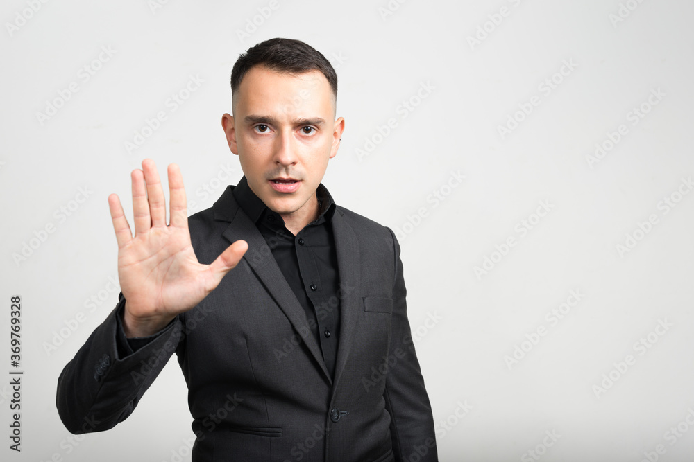 Portrait of handsome businessman in suit against white background Portrait of handsome businessman in suit against white background