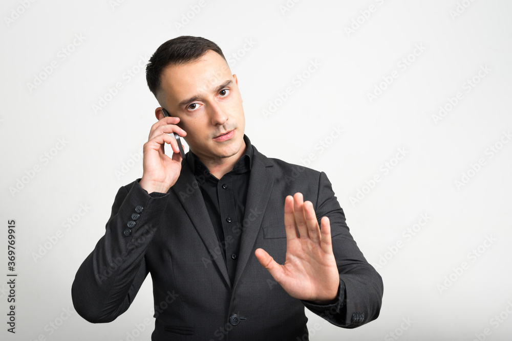 Portrait of handsome businessman in suit against white background Portrait of handsome businessman in suit against white background