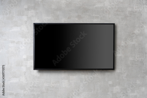 Foto TV mockup background with lcd tv fixed on a wall