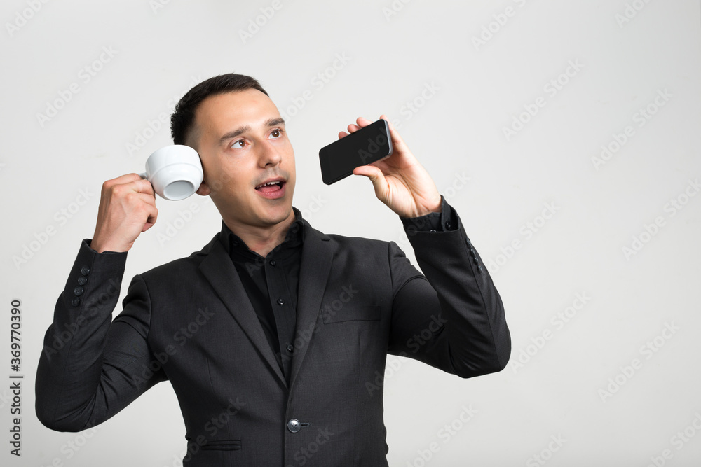 Naklejka premium Portrait of handsome businessman in suit against white background