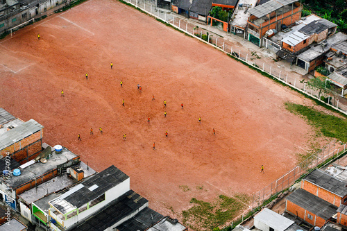 Canvas Print aerial view of earth football field in favela in Sao Paulo, Brazil