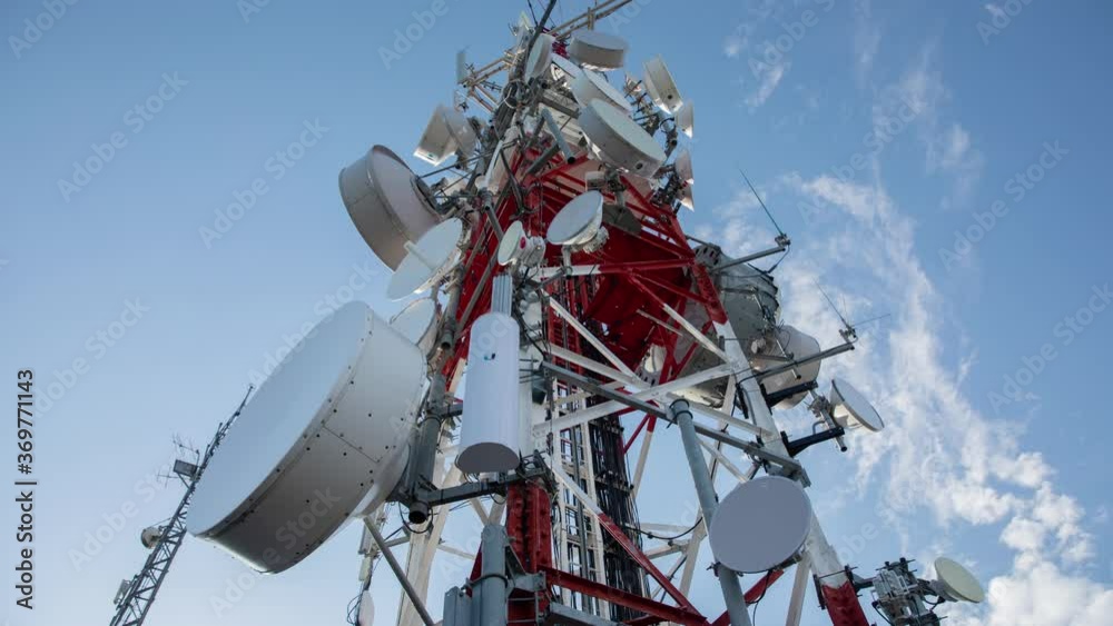Time lapse footage of clouds passing radio tower