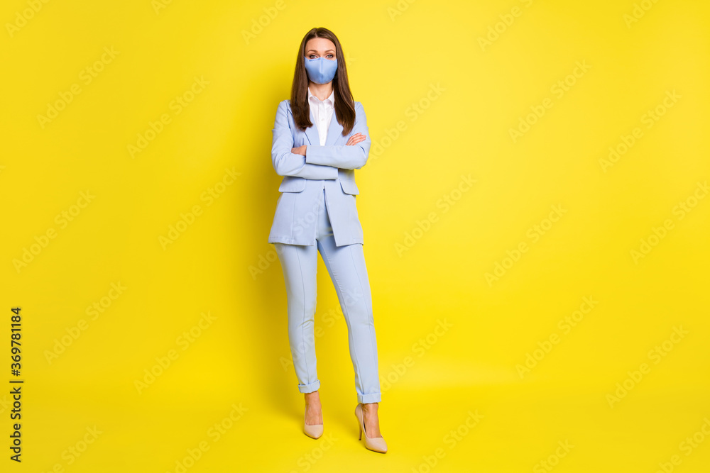 Full length photo boss banker investor girl cross hands ready work office covid infection have medical safe mask wear blue jacket trousers high-heels isolated bright shine color background Full length photo boss banker investor girl cross hands ready work office covid infection have medical safe mask wear blue jacket trousers high-heels isolated bright shine color background