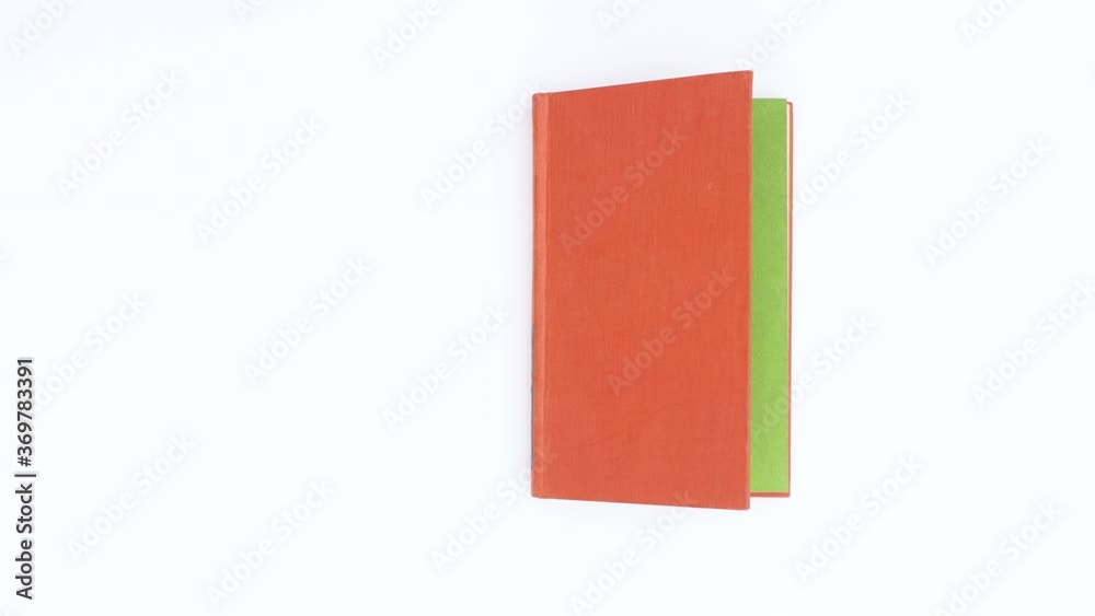 orange book appear and open. Stop motion 