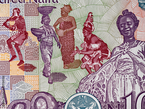 Traditional african dancers on Nigeria 100 naira banknote close up macro, Nigerian money closeup