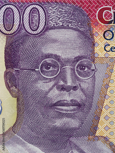 Chief Obafemi Awolowo portrait on Nigeria 100 naira banknote close up macro, Nigerian money closeup photo