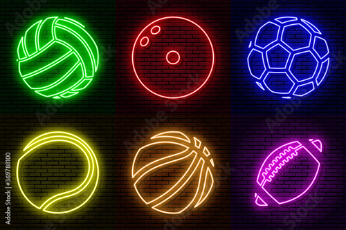 Neon sign against a brick wall. A set of different colored balls. To decorate sports bars, cafes, restaurants, pubs. Isolated.