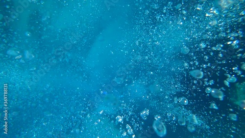Fethiye, Turkey - 30th of July 2020: 4K Many small air bubbles rise up from the deeps
