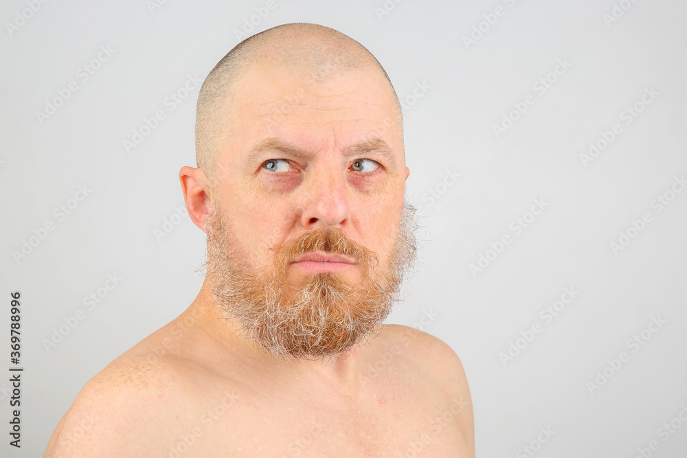 Obraz premium portrait of a bearded man on a light background