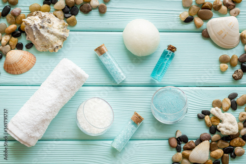 Spa treatments set with sea cosmetics - salt and aroma oil. Top view