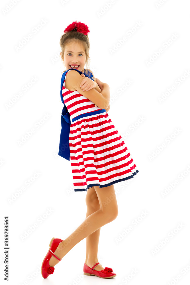 Little girl in an elegant dress.The concept of a happy childhood Little girl in an elegant dress.The concept of a happy childhood