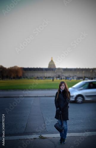 Landmarks of Paris. A girl walks through the streets of Paris