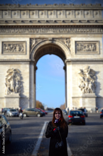 Landmarks of Paris. A girl walks through the streets of Paris