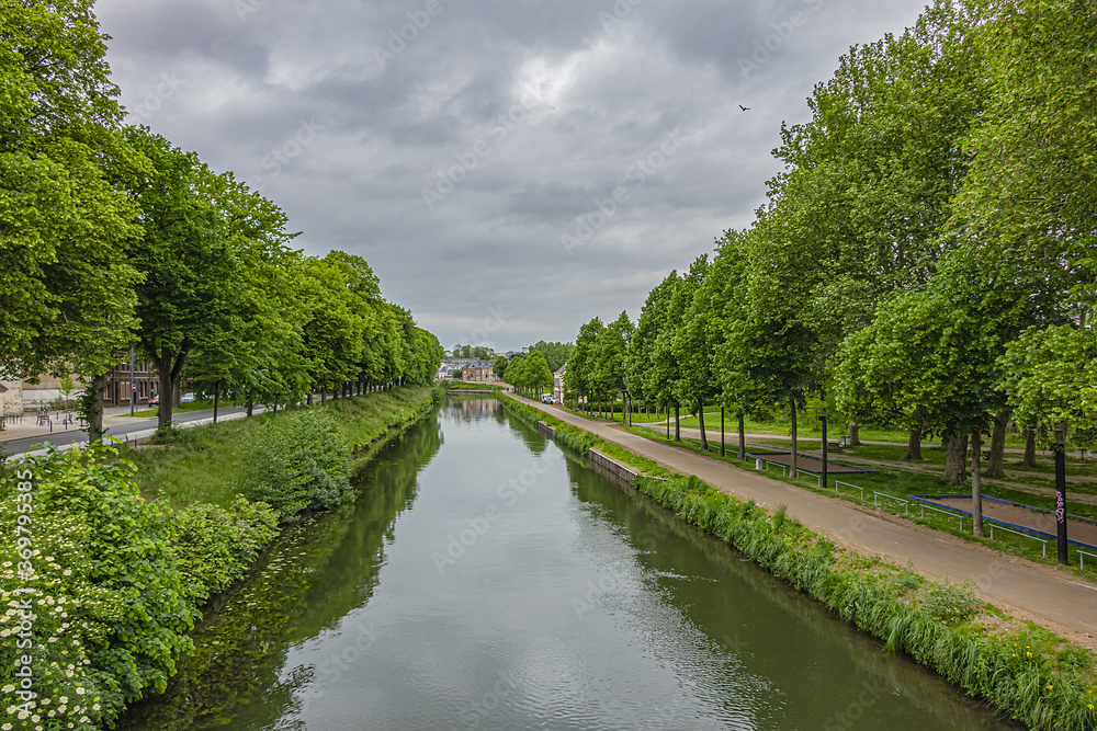 View of banks of the Somme River in Amiens. Amiens – city in northern France, in the department of Somme, region of Picardie.