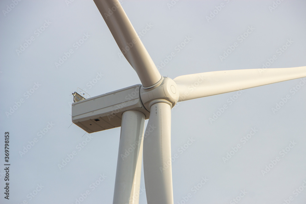 Wind turbine, windmill that produces electricity in an environmentally friendly way, close-up of a windmill to generate electricity. Wind turbine, windmill that produces electricity in an environmentally friendly way, close-up of a windmill to generate electricity.