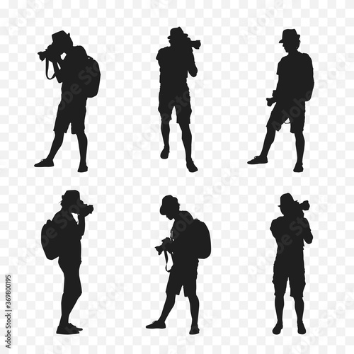 Silhouette of a tourist with camera