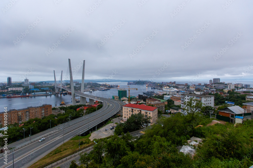 Golden Bridge over the Golden Horn Bay in Vladivostok in cloudy weather