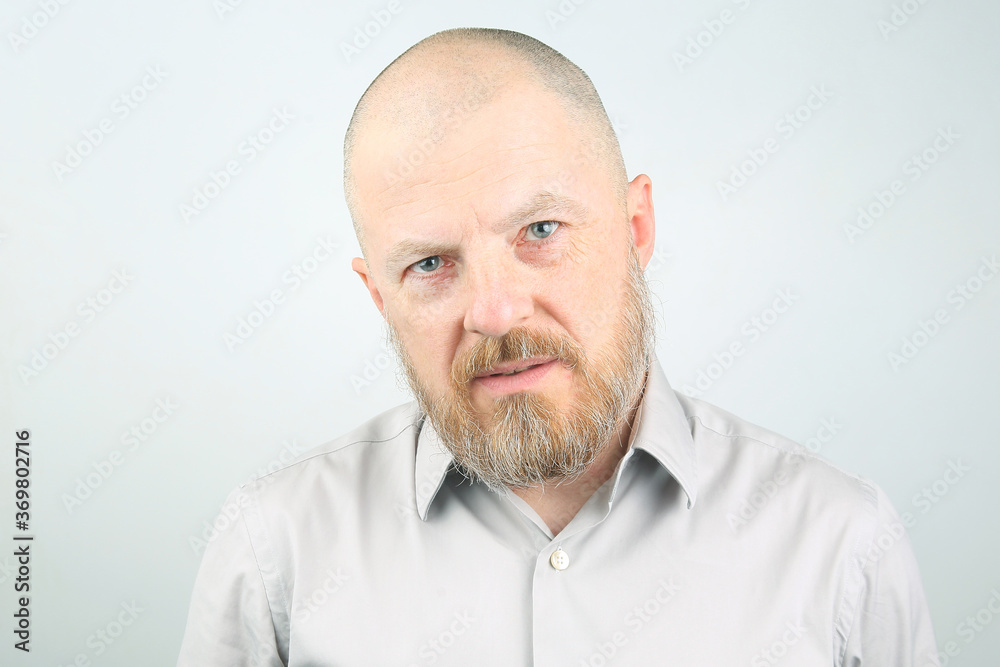 Portrait of a bald and bearded happy man Portrait of a bald and bearded happy man