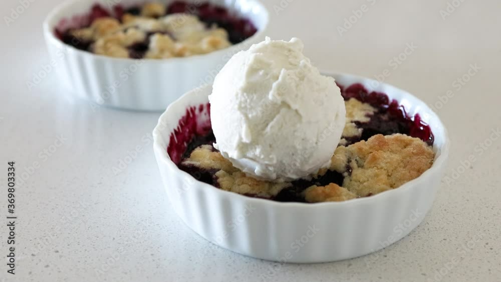 Adding Vanilla Ice Cream to Blueberry Cobbler Adding Vanilla Ice Cream to Blueberry Cobbler