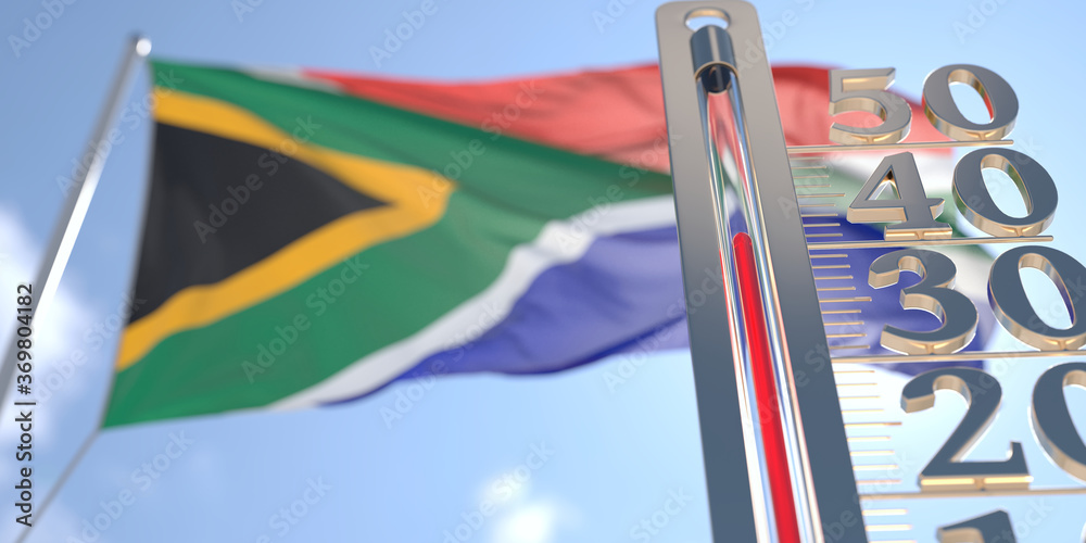 Temperature Rise Flag Thermometer shows high air temperature against blurred flag of South ...