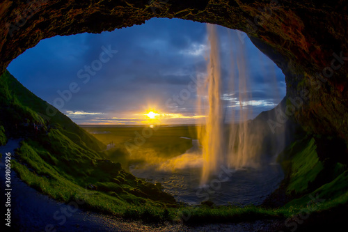 Seljalandsfoss waterfall at sunset. Iceland