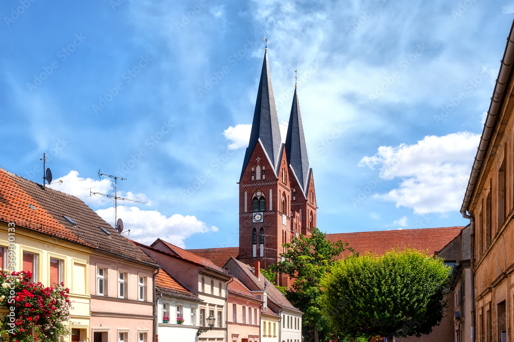Fototapeta premium Cityscape of Neuruppin with the church Sankt Trinitatis in the background