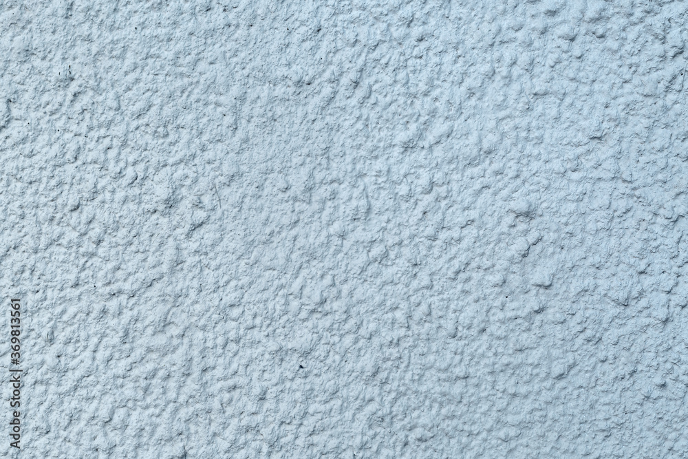 A fragment of a roughly plastered wall. A fragment of a roughly plastered wall.