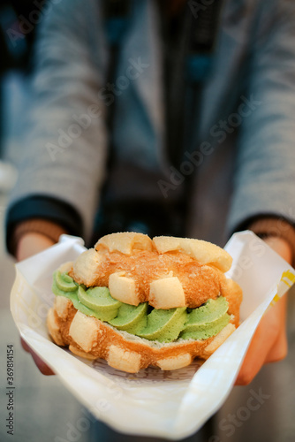 Freshly baked Melon pan with Matcha ice cream, japanese bakery