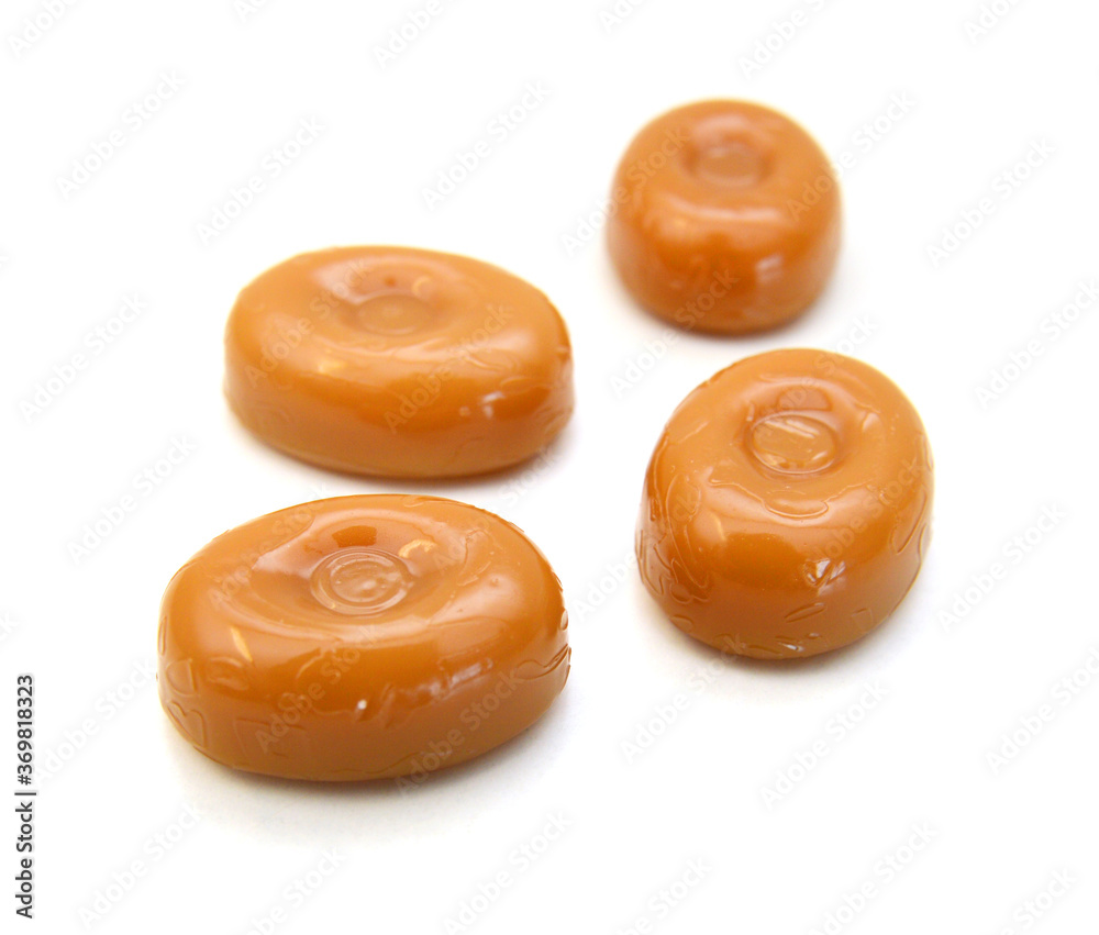 Caramel candies isolated on white background Caramel candies isolated on white background