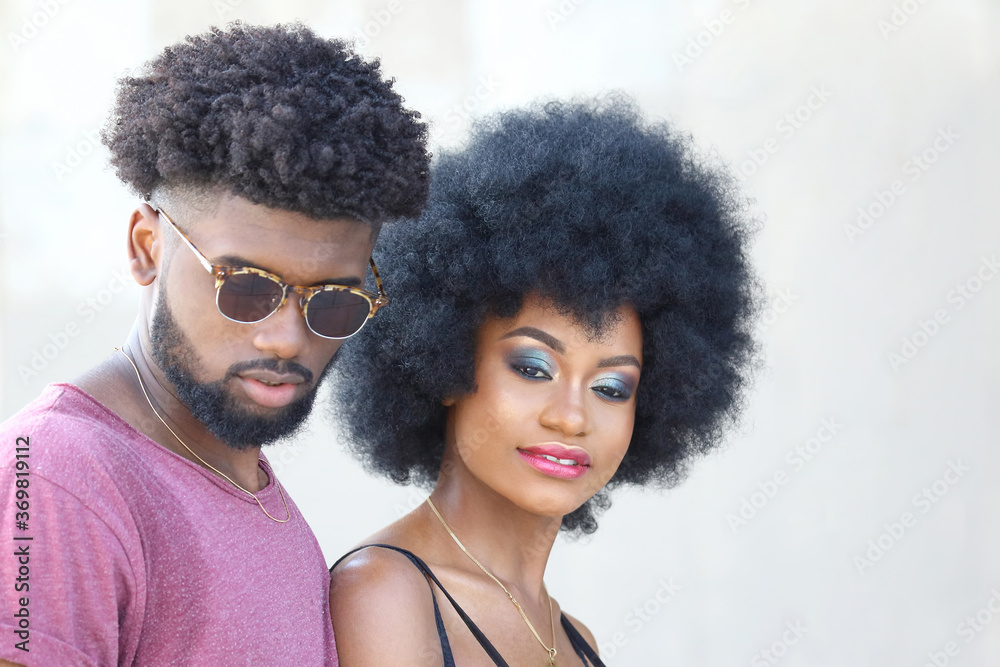 fashionably dressed young black man and woman fashionably dressed young black man and woman