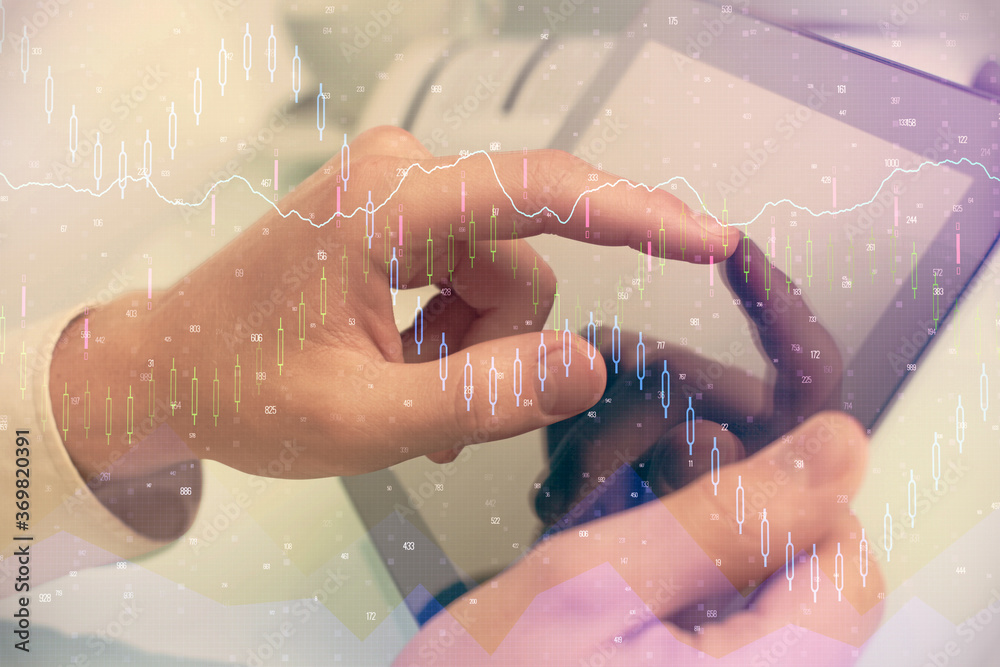 Multi exposure of man's hands holding and using a phone and financial chart drawing. Market analysis concept. Multi exposure of man's hands holding and using a phone and financial chart drawing. Market analysis concept.