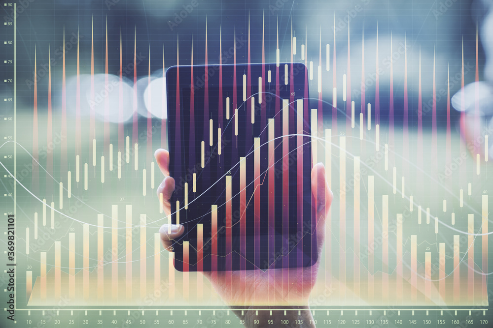 Double exposure of forex chart sketch hologram and woman holding and using a mobile device. Financial market concept. Double exposure of forex chart sketch hologram and woman holding and using a mobile device. Financial market concept.